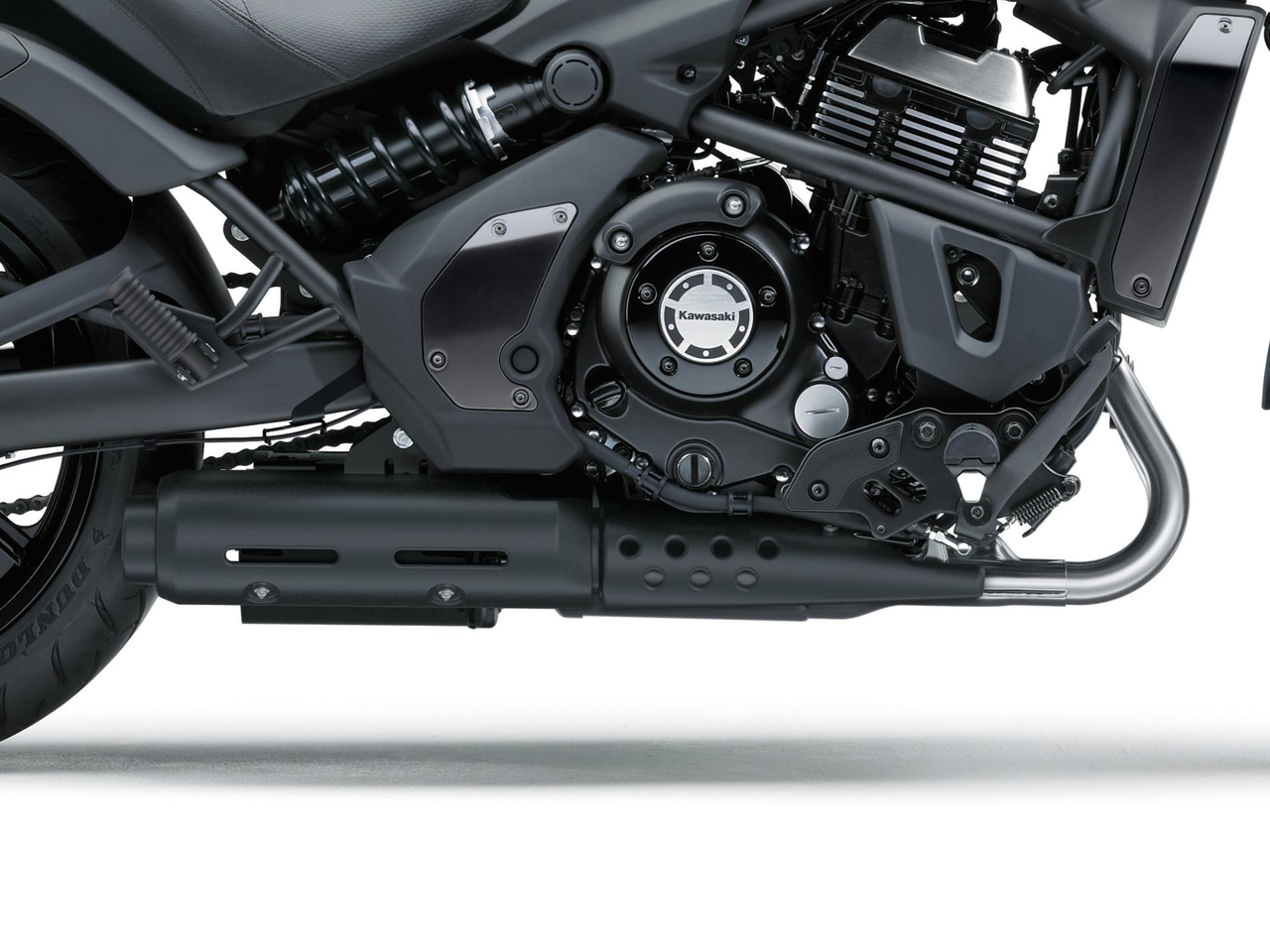 Under‑motor lyddemper